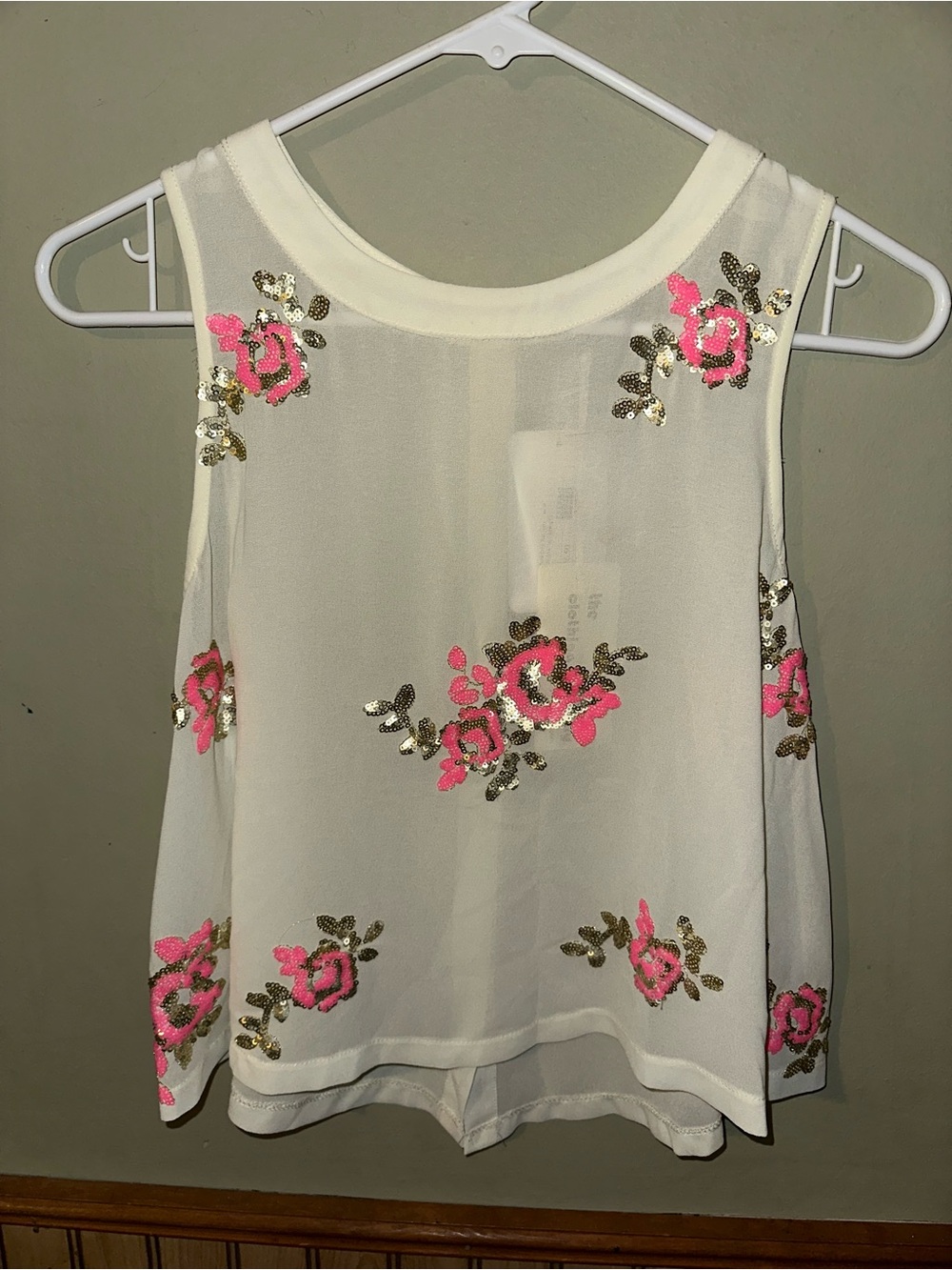 the clothing company Cream Floral Sequin Sleeveless Camisole